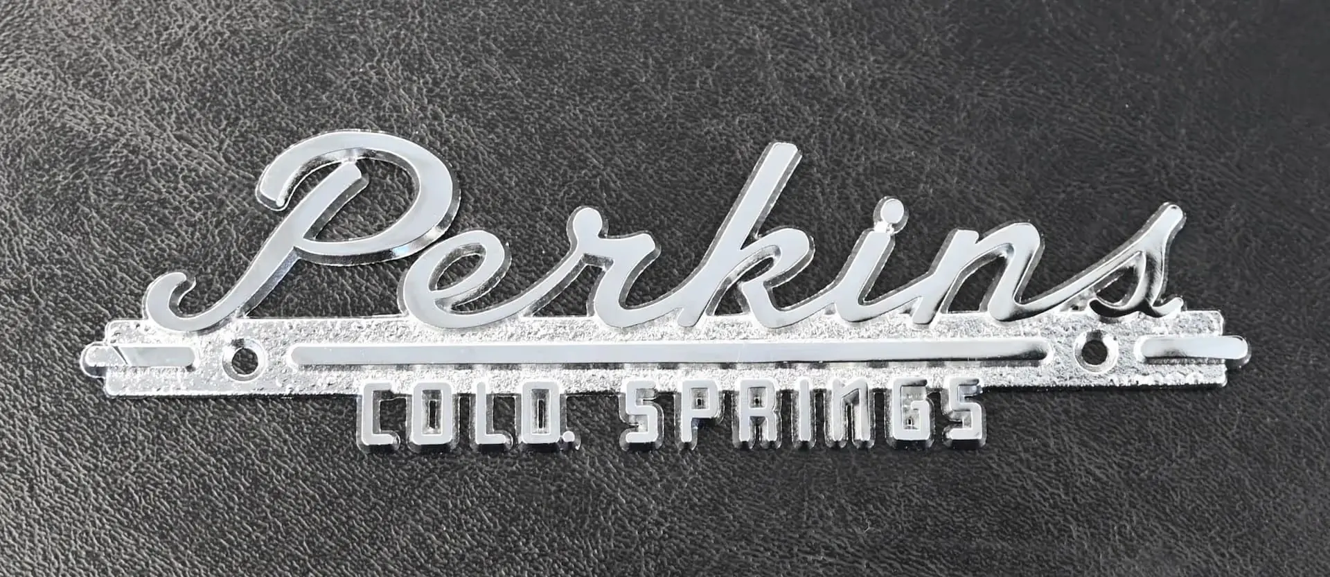 Vintage Perkins logo.